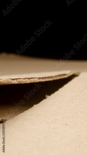 MACRO: Motion along a disassembled cardboard box