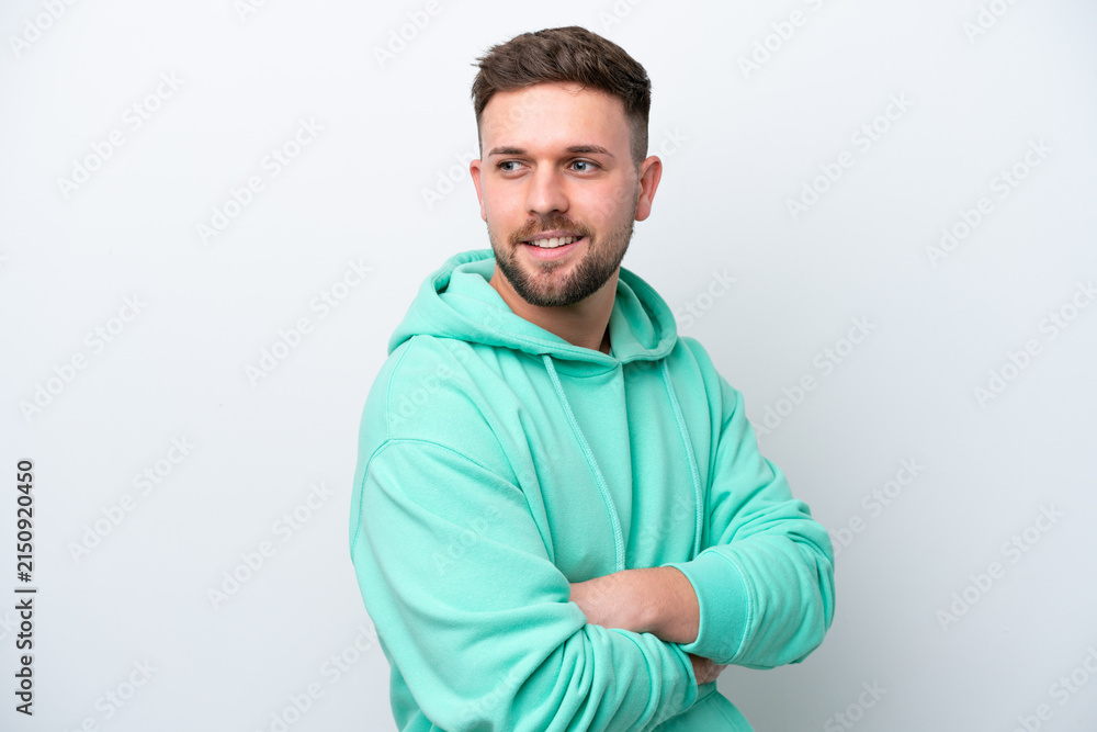 Fototapeta premium Young caucasian man isolated on white background happy and smiling