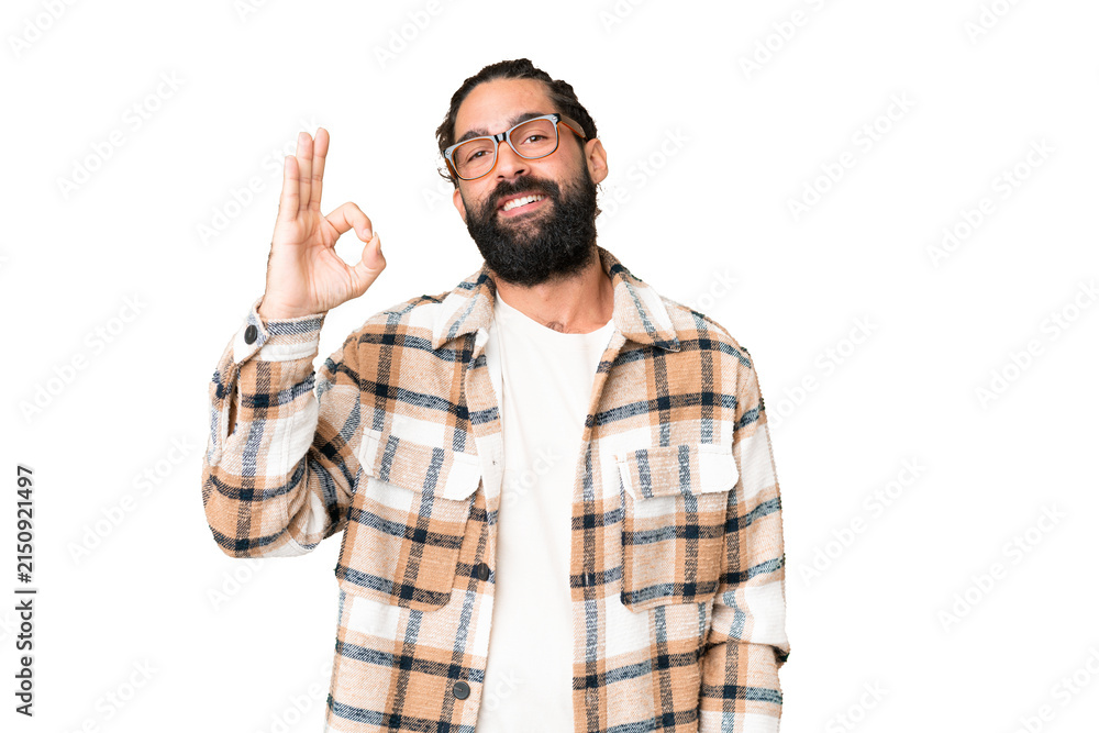 Obraz premium Young man with beard over isolated chroma key background showing ok sign with fingers
