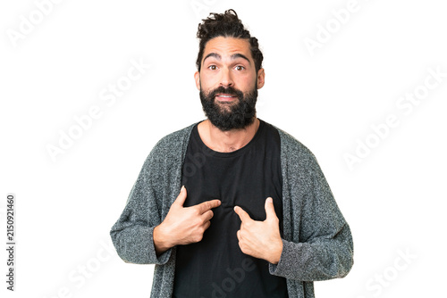 Konstfotografi Young man with beard over isolated chroma key background pointing to oneself