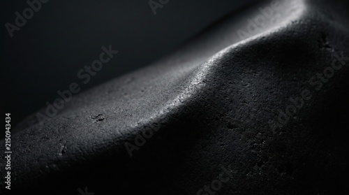 Black Rough Textured Surface with Dramatic Light