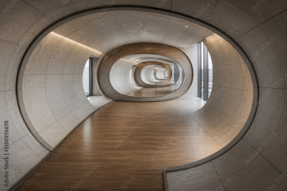 Fototapeta premium Modern architectural interior featuring a series of curved concrete hallways with wooden flooring and large windows allowing natural light to enter the space