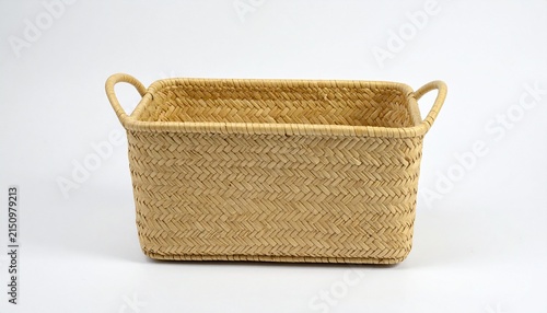 Rectangular woven basket with handles on white background