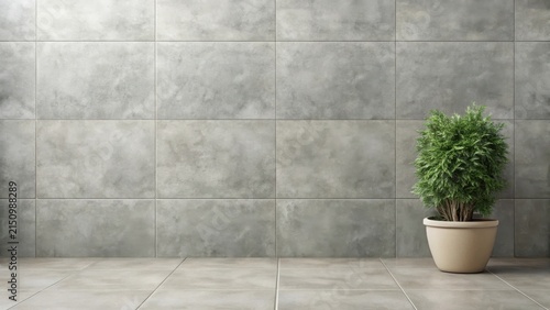 Modern minimalist interior design featuring a potted plant against a gray tile wall