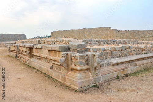 Bild auf Leinwand Ancient stone temple ruins and historic carved architecture in Hampi, India