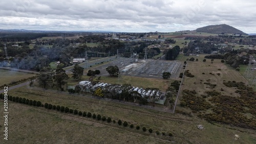 Fotografie Electrical substation providing energy transmission to rural landscape