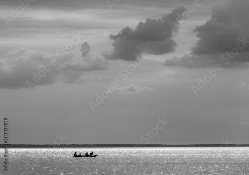 Kyiv Reservoir Under Dramatic Clouds with a Small Boat, Ukraine