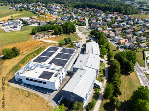 Fotografie Aerial view of a European town with solar panels installed on rooftops