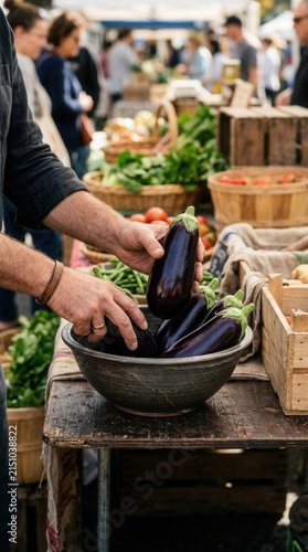 Fresh Eggplants Selected At A Bustling Outdoor Farmers Market