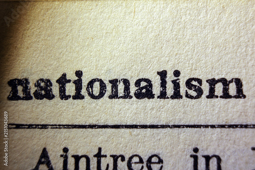 фотографія Word nationalism on dictionary page, macro close-up