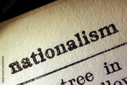 Word nationalism on dictionary page, macro close-up
