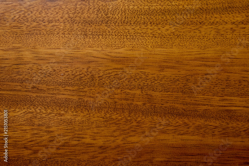Top view of empty golden brown teak or mahogany natural wood grain texture background table surface pattern