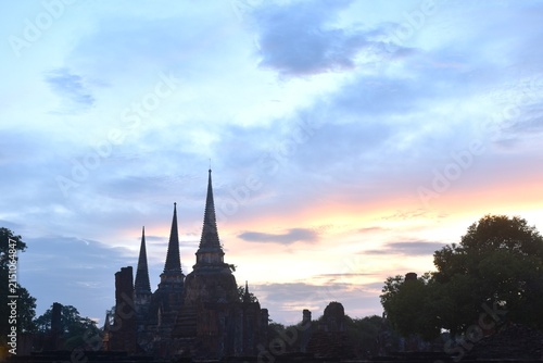 pagoda of Wat Phra Si Sanphet or temple of the holy, splendid Omniscient in twilight sunset sky background on evening