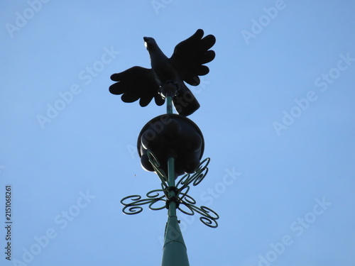 Fotografie weather vane against blue sky