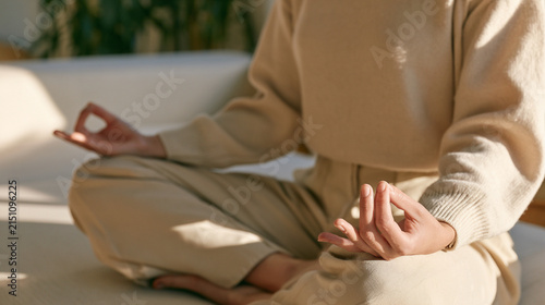 Close Up of Relaxed Hands and Peaceful Posture during Home Meditation and Wellness Practice