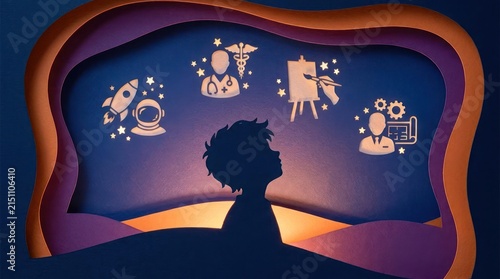 Child silhouette dreaming of future career paths.