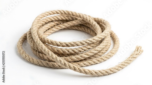 Coiled natural fiber jute rope isolated on white background.