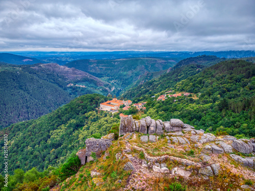 Fotografie Monastery of San Estevo from the ruins of an ancient hill fort.