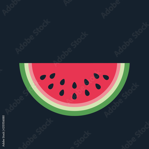 Cross-section of a watermelon with seeds on a dark background.