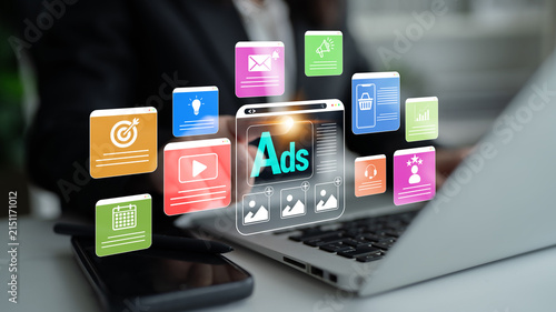 Quadro su tela Digital Marketing Strategy with Ads Concept, Laptop Interface Showing Various Marketing Tools and Icons for Online Advertising Campaigns and Analytics Fluxor