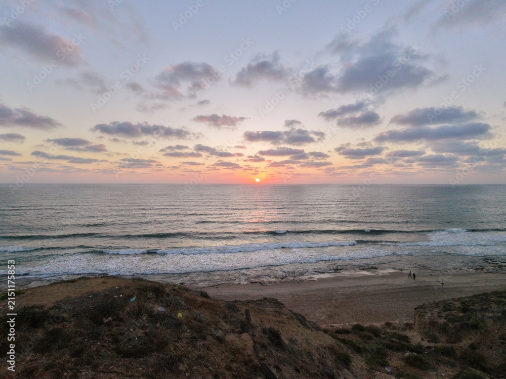 Obraz premium Ocean sunset from coastal cliffs