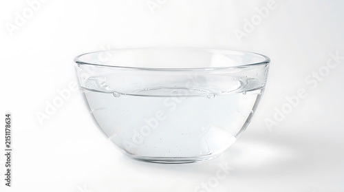 Clear glass bowl filled with clean fresh water.