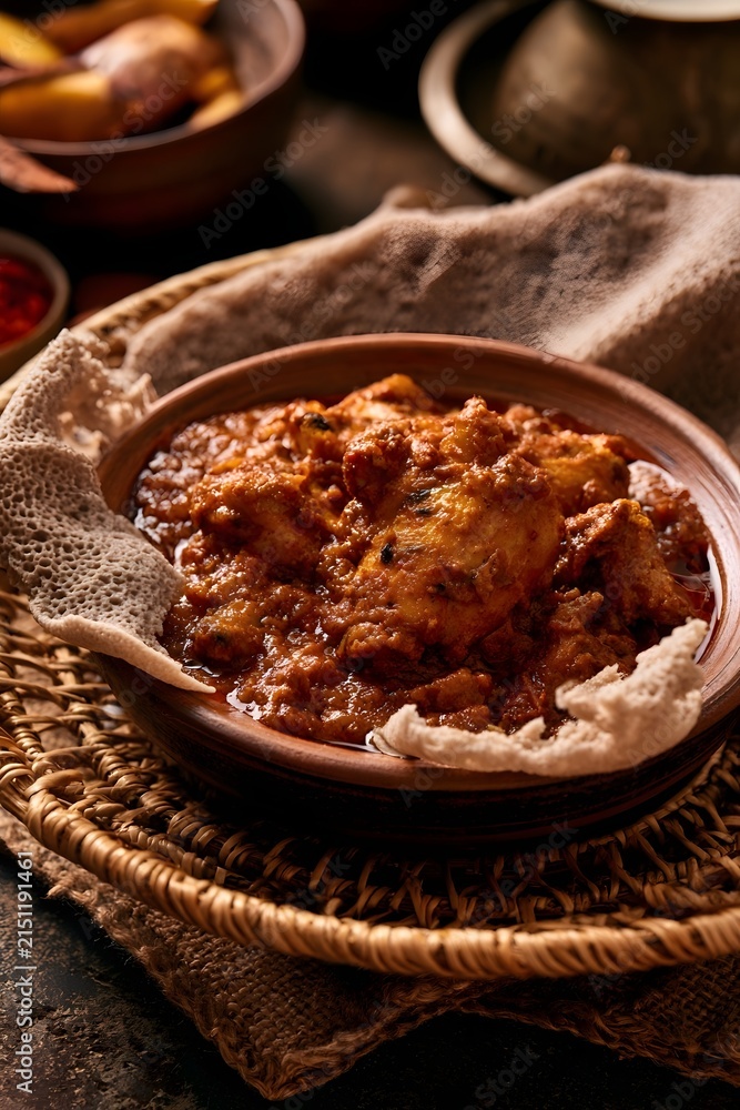 Fototapeta premium Ethiopian injera with doro wat stew