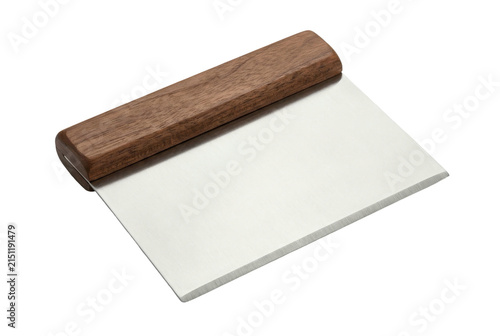 Fototapeta kuchenna Metal dough scraper with wooden handle isolated on black background