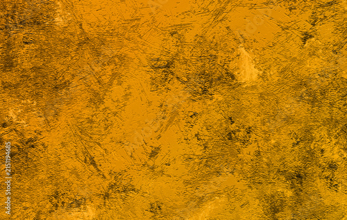 Abstract golden yellow and mustard plaster texture featuring rough brush marks, distressed paint, grunge details, and an organic uneven surface. Ideal for backgrounds, posters, designs