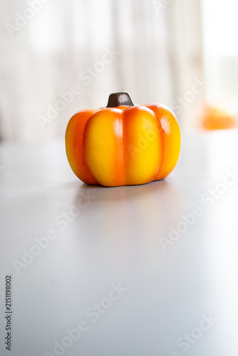 halloween pumpkin decoration on wooden table
