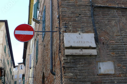 Eed No Entry Traffic Sign on Street in Front of European Classical Building