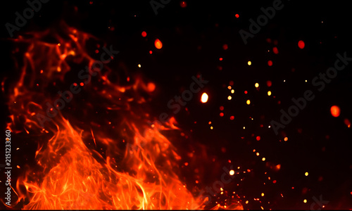Realistic fire flames and sparks on a black background dramatic burning embers and intense heat