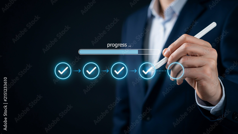Obraz premium Businessman using stylus to complete a digital progress bar with checkmarks on dark background