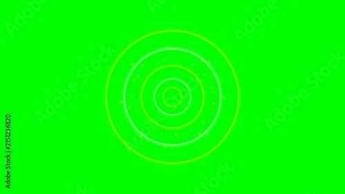 Abstract concentric circles with floating particles on a green screen background