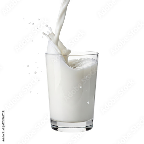 Milk being poured into a glass isolated on white background