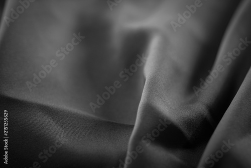 Soft Black Fabric Texture with Gentle Waves and Creases