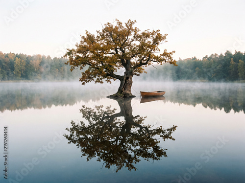 Storm clouds gather over a lonely tree standing in rough sea waters during a heavy rainstorm Generative AI