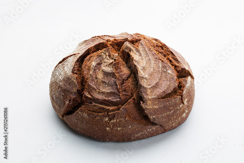 Rye bread without yeast on a white background.