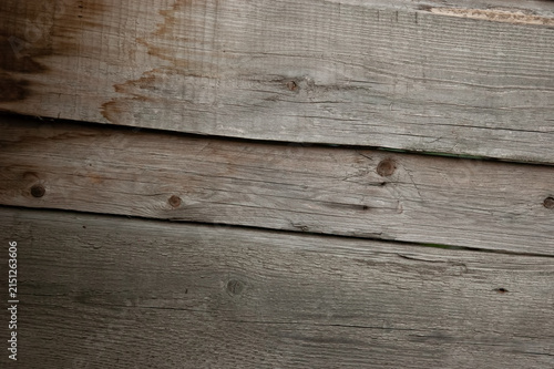 Foto Old faded wooden boards with a weathered surface and rough natural texture