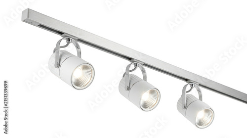 Modern track lighting system with three white spotlights isolated on transparent background