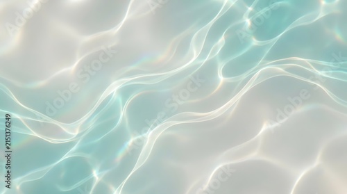Clear blue water surface with ripple waves reflecting bright sunlight patterns