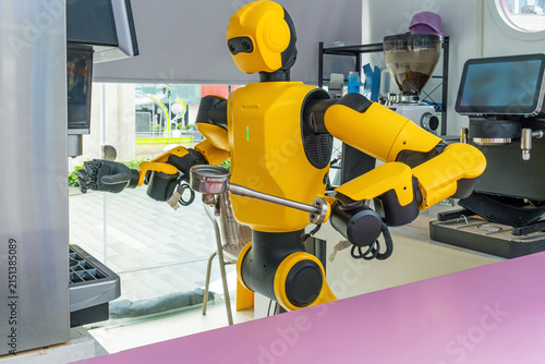 Fotografie Humanoid robot prepares coffee using automatic coffee machine in Shenzhen, China