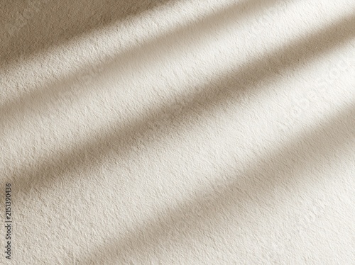 Soft Beige Fabric Background with Sunlight Shadows and Texture Detail