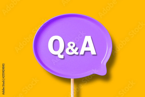 Q&A Text concept. Question and answer speech bubble on yellow background. 