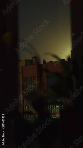 Moon runs over the buildings timelapse