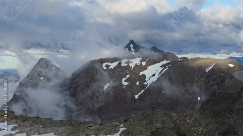 Majestic Snow-Capped Mountains with Moving Clouds in British Columbia, Canada