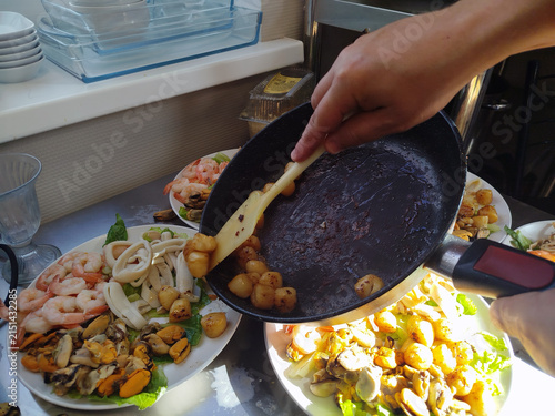 Preparing multiple portions of homemade food in kitchen