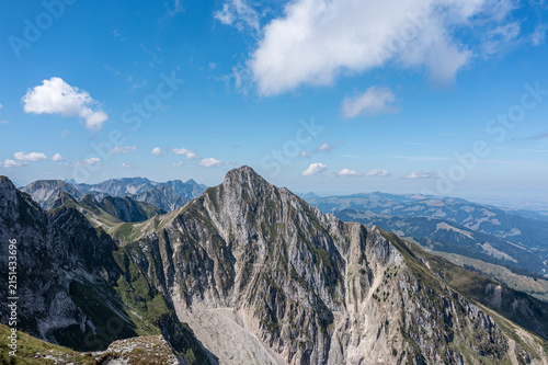 Dramatic limestone ridge and jagged summit in the Bernese Oberland - panoramic aerial mountain landscape, Swiss Alps