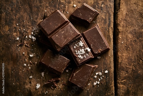 Artisan Dark Chocolate Chunks with Sea Salt on Rustic Wood