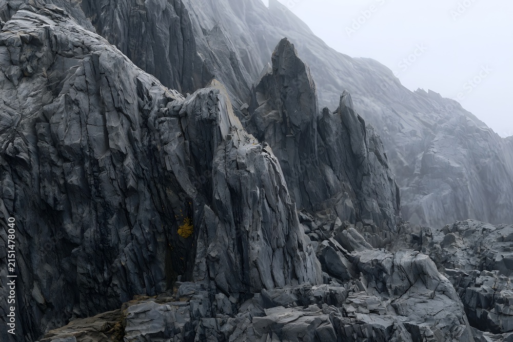 Fototapeta premium Intimate Detail of Jagged Basalt Rock Formation with Yellow Lichen